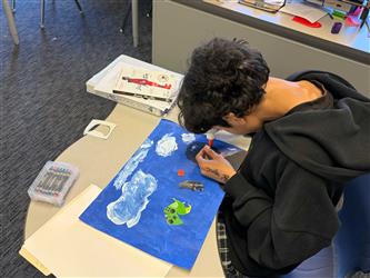 Student working on art project
