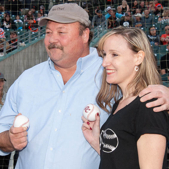 Teachers holding baseballs