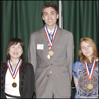 Smiling students wearing medals