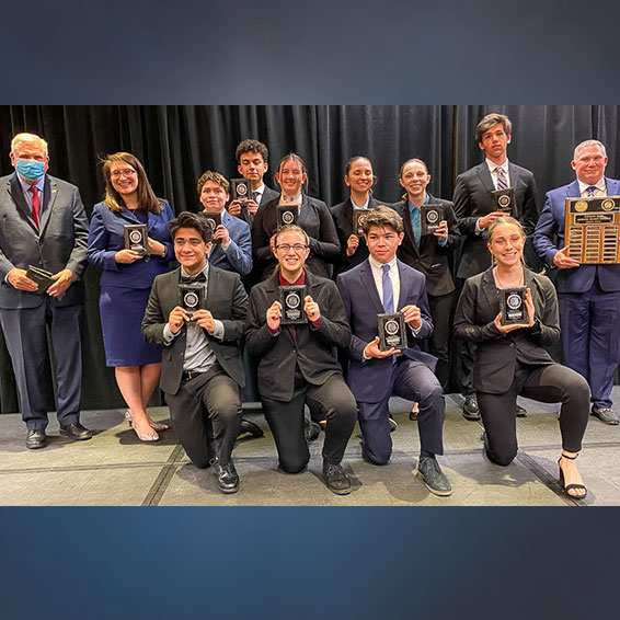 Elk Grove High School team holding trophies