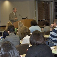 Marty Cavanaugh speaking to audience