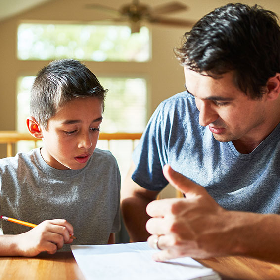 Father studying with son