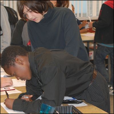 Student signing in to vote