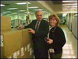 David Meaney and Andrea Willis with shipping boxes