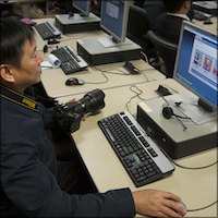Chinese delegate visits U.S.A. Learns website