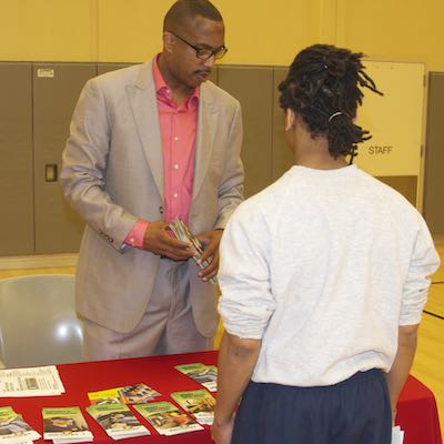 Representative speaking with court school student