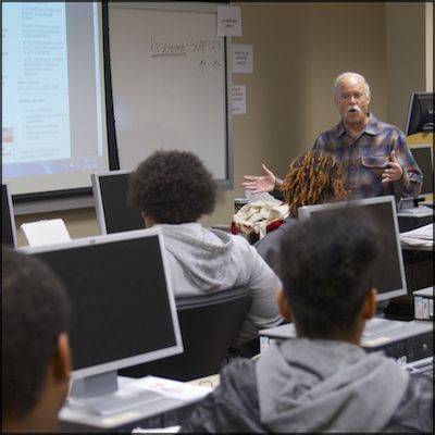 Students listen to speaker