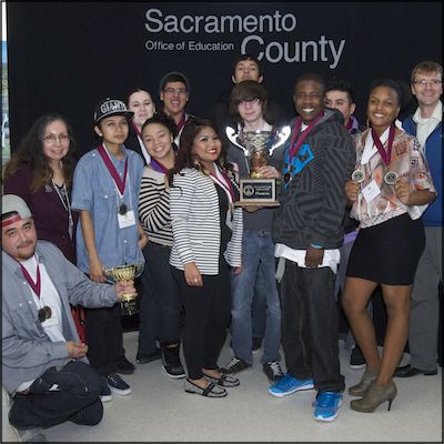 Daylor High School students with trophy