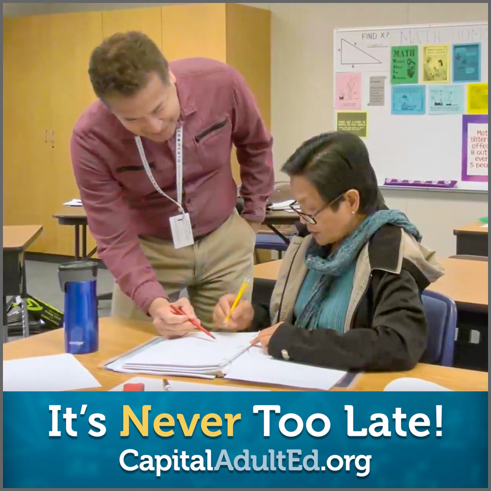 Educator helping adult learner