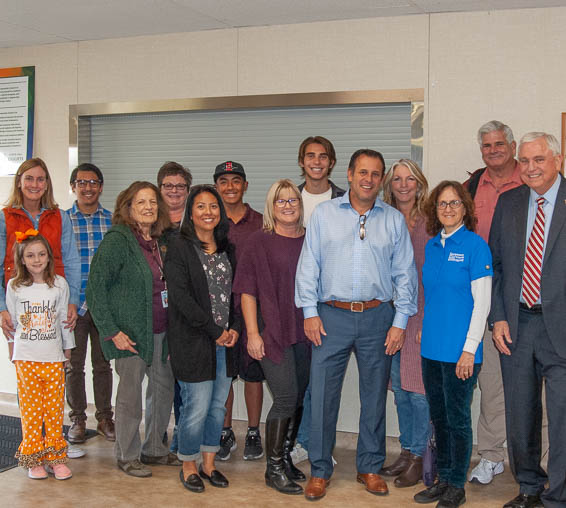 Group photo of staff with Board trustees