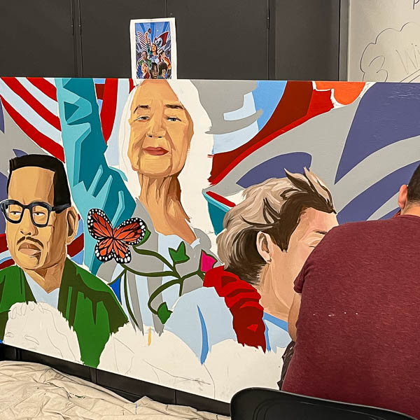 Partially completed mural showing civil rights leaders