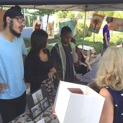 Students talking to staff