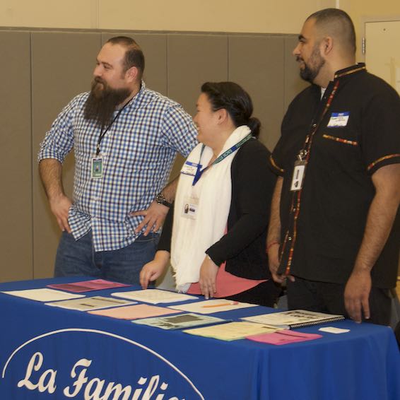 Adults talking about resources with Juvenile Court School students