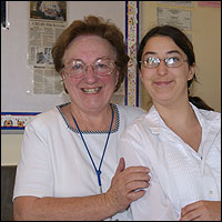 Culinary teacher with student