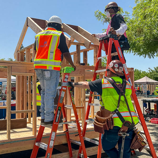 Students on ladders working