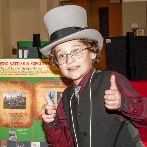 Student in top hat posing