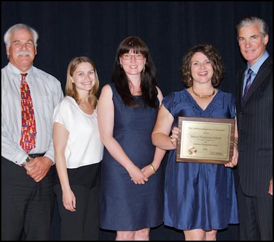 School staff receiving award