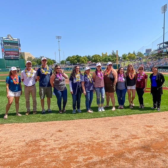 Teachers posing on-field