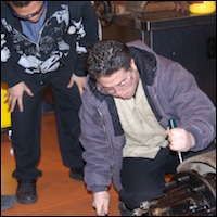 Student working on brakes