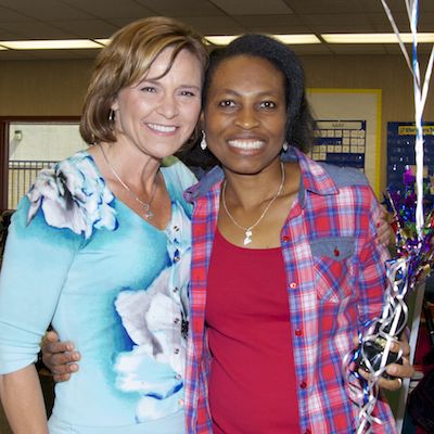 Beth Vieira with Oluchi Okemiri holding balloons