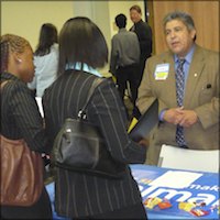 Representative speaking with students