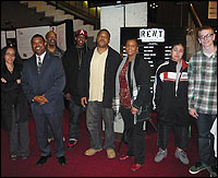 Students in front of Rent sign