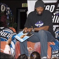 John Salmons reading a book about Barack Obama