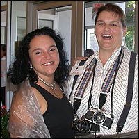 Staff dressed for the red carpet, carrying cameras