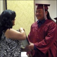 Certificate recipient presented with plaque