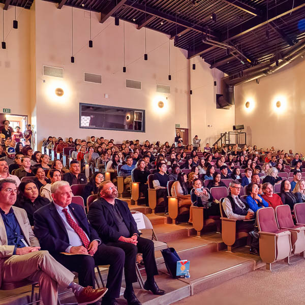 Audience seated in theater