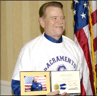 Veteran holding diploma