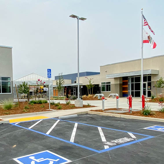 Exterior of Colley High School building showing sign