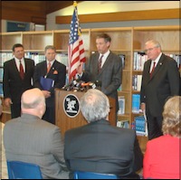 Jack O'Connell speaking at podium