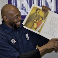 Player reading to students