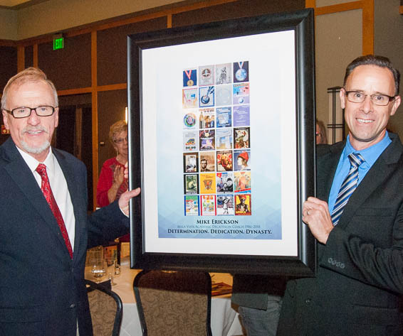 Craig Irish presenting framed poster to Mike Erickson