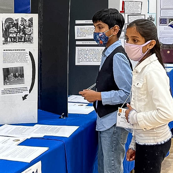 Students looking at projects