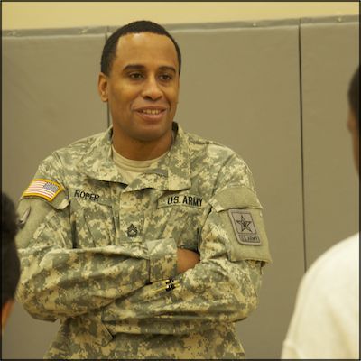 U.S. Army representative talks with students