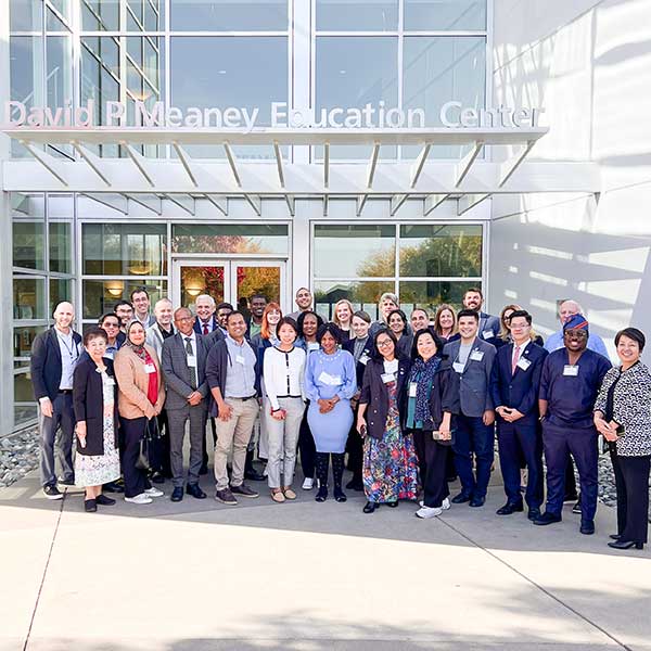 Group posing in front of SCOE's David P. Meaney Education Center