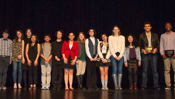 Student competitiors posing on stage