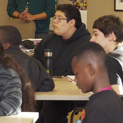 Students listening to presentation.