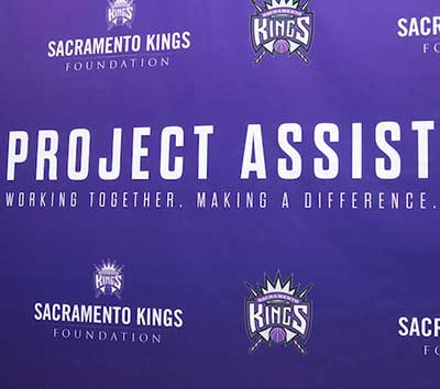 Sacramento Kings Foundation Project Assist banner with Kings logos