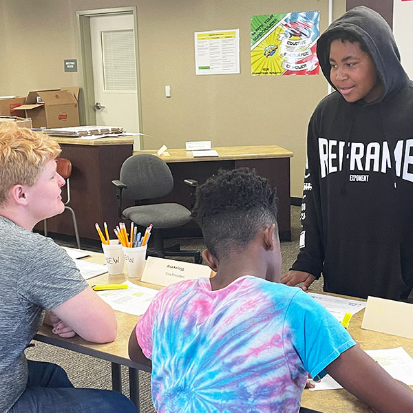 Student checking in to vote