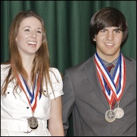 Students with medals around their necks