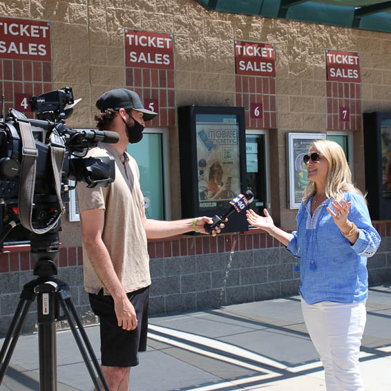 Teacher of the Year being interviewed by cameraman