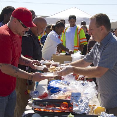 Attendees receiving food