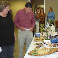 Employees selecting cookies