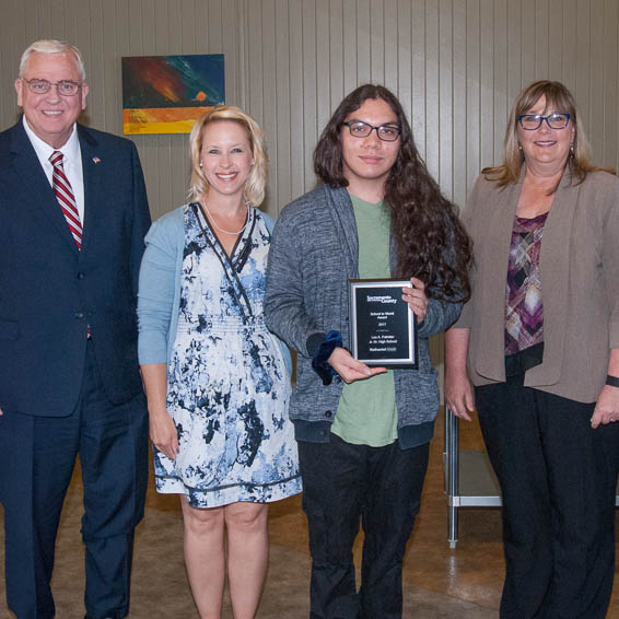 Nathaniel C. receiving plaque