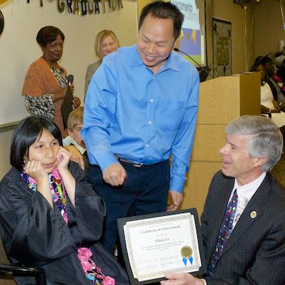 Student receiving certificate