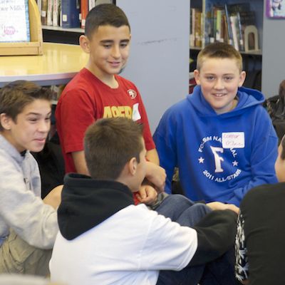 Group of seated students talking