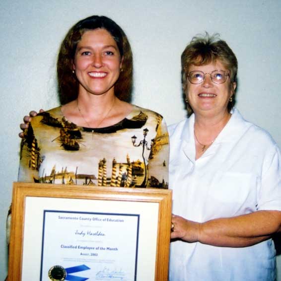 Judy Haselden with Principal Judy Yamamoto.